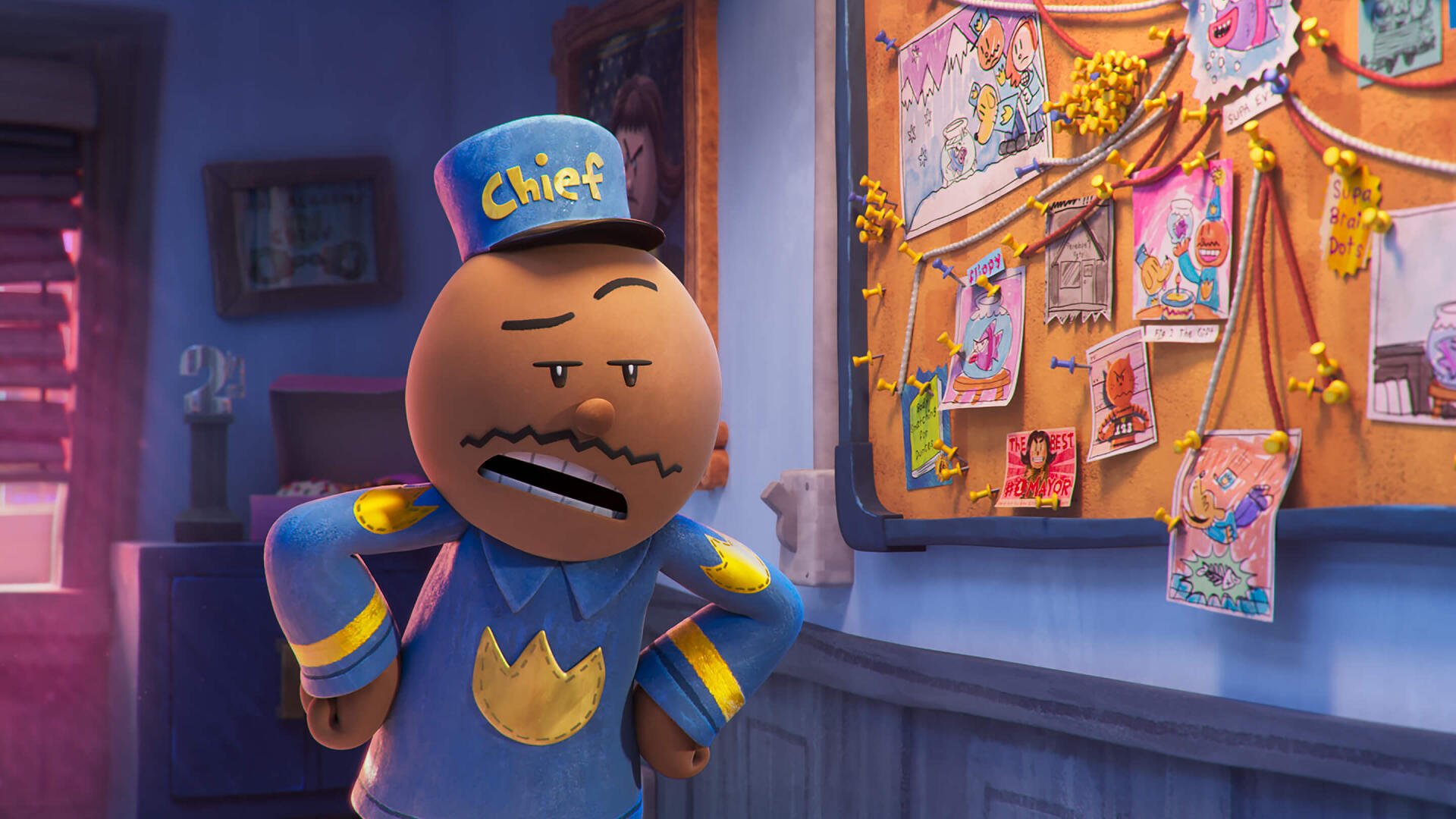 A character from the movie *Dog Man (2025)* stands confidently in a colorful animated scene, surrounded by a bulletin board filled with various drawings and notes.