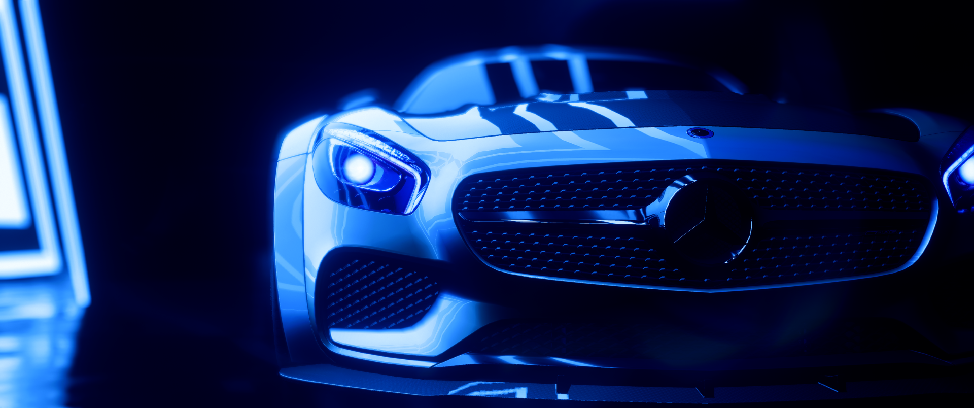 Close-up front view of a blue-lit Mercedes-Benz sports car, styled for Need for Speed Heat, 2K Quad HD PC desktop wallpaper and background.