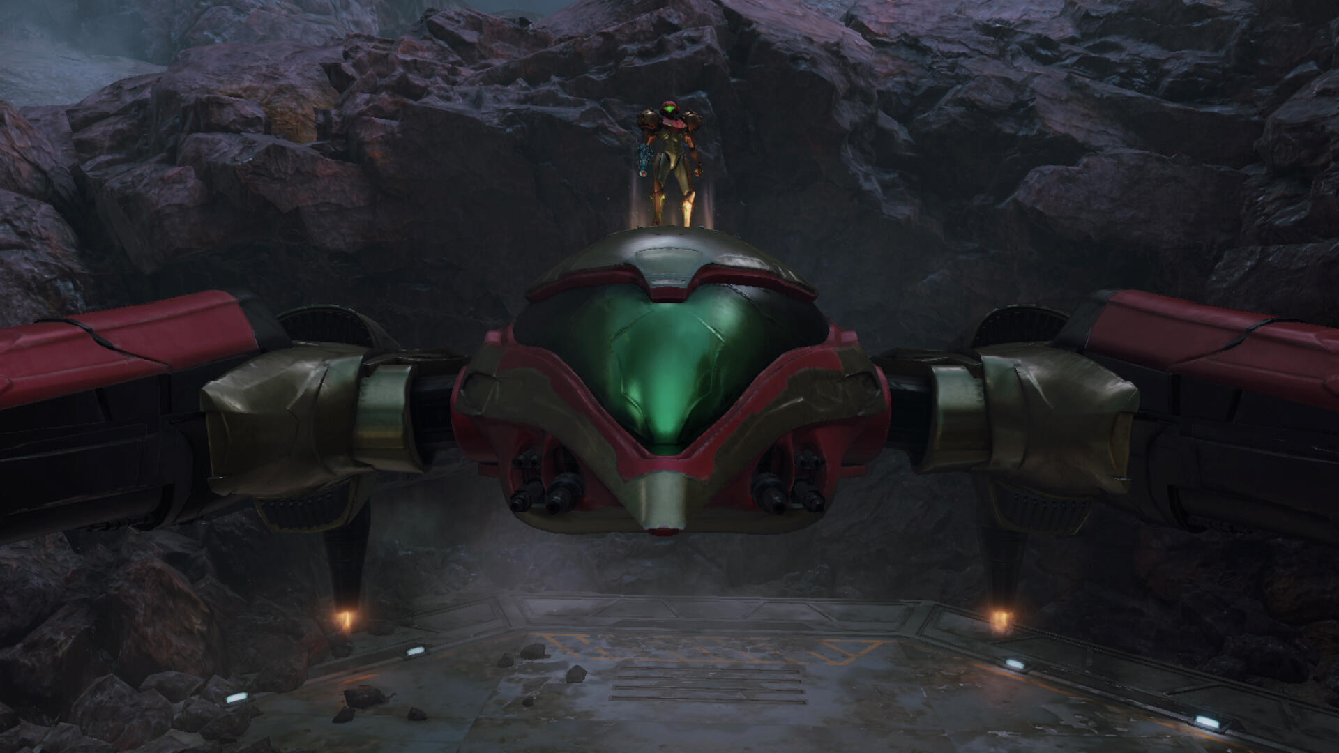 A high-definition desktop wallpaper featuring a futuristic vehicle and character from the video game Metroid Prime 4: Beyond, set against a dramatic rocky backdrop.