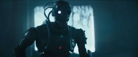 A detailed HD wallpaper from the TV show Star Wars: Skeleton Crew, featuring a futuristic robot with glowing eyes against a dimly lit backdrop.