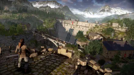 A scenic 4K Ultra HD wallpaper from Sniper Elite: Resistance, showcasing a soldier overlooking a dam surrounded by mountains and lush greenery under a dramatic sky.