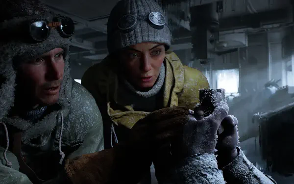 Two explorers, clad in winter gear, examine a mysterious artifact in a dimly lit, icy environment from Indiana Jones and the Great Circle, depicted as an HD PC desktop wallpaper.
