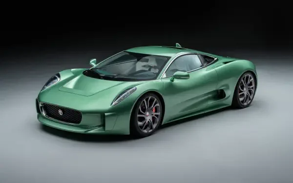 A stunning Jaguar C-X75 in a sleek green finish, showcasing its aerodynamic design and modern elegance, perfect for an HD PC desktop wallpaper and background.