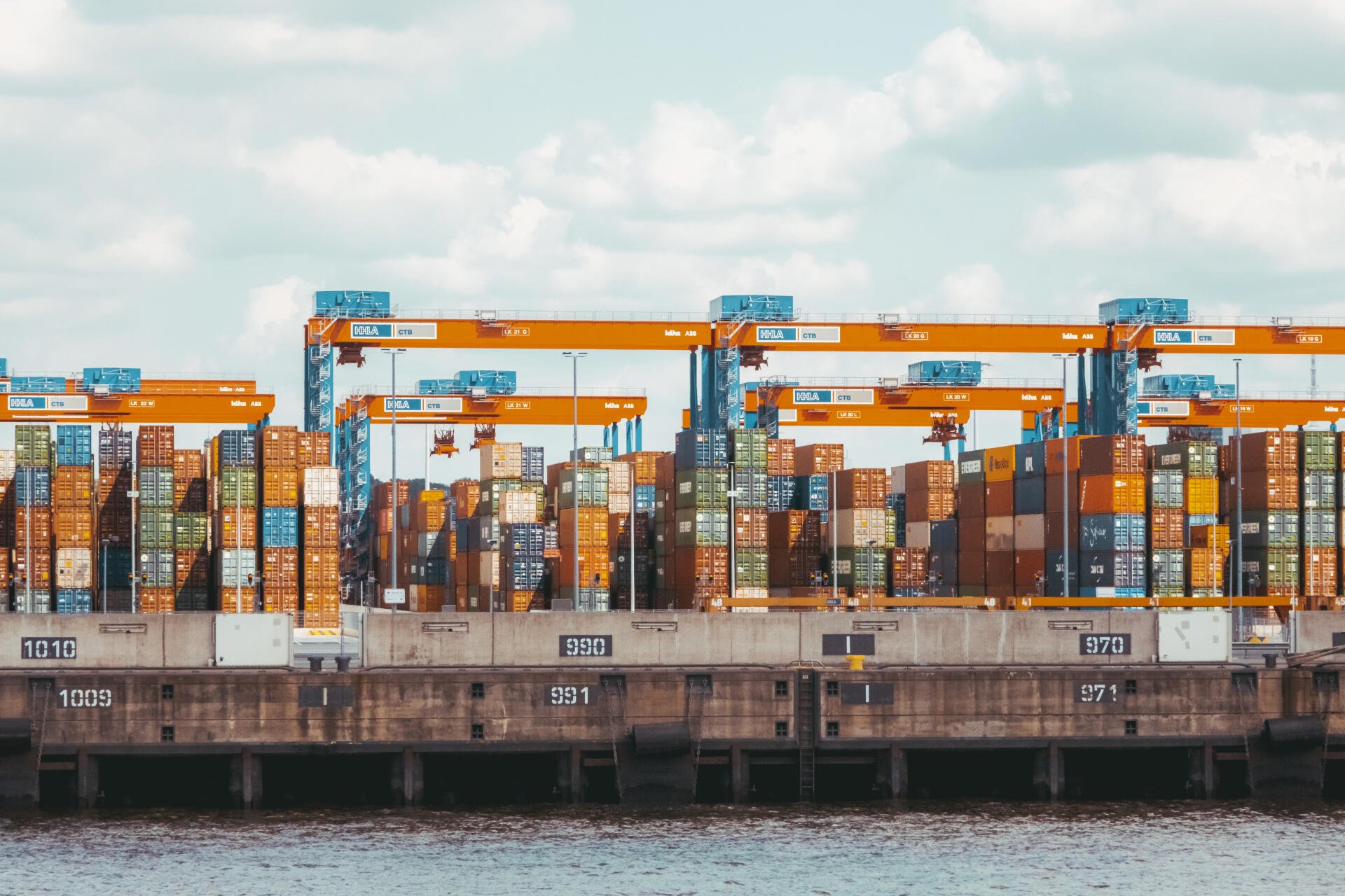 Colorful Containers in Hamburg Harbour by MainBaze