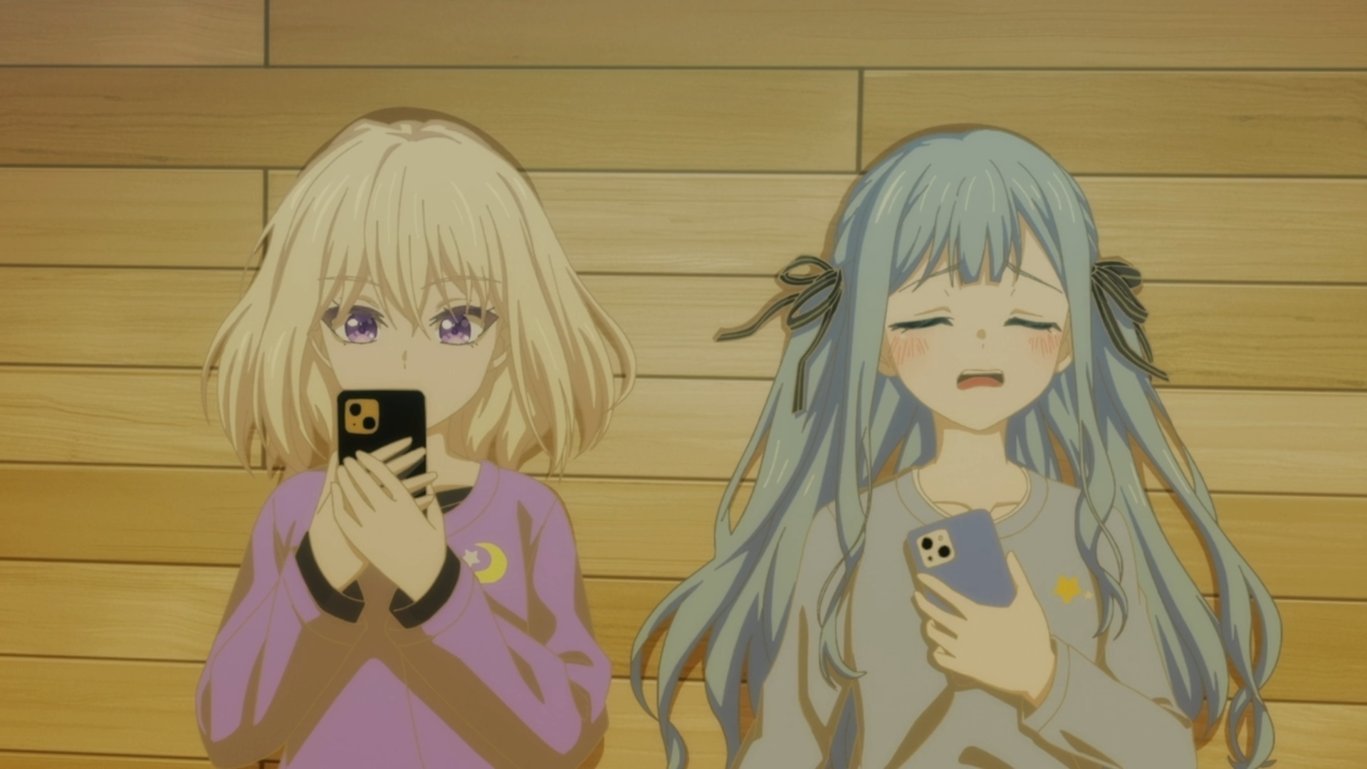Two anime characters from BanG Dream! Ave Mujica are holding smartphones, standing against a wooden background. The image captures a candid moment in 4K Ultra HD quality.
