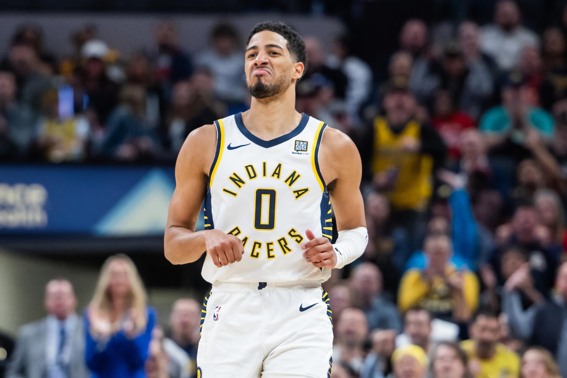Tyrese Haliburton in Indiana Pacers uniform on an NBA court, captured in a high-definition PC desktop wallpaper and background.
