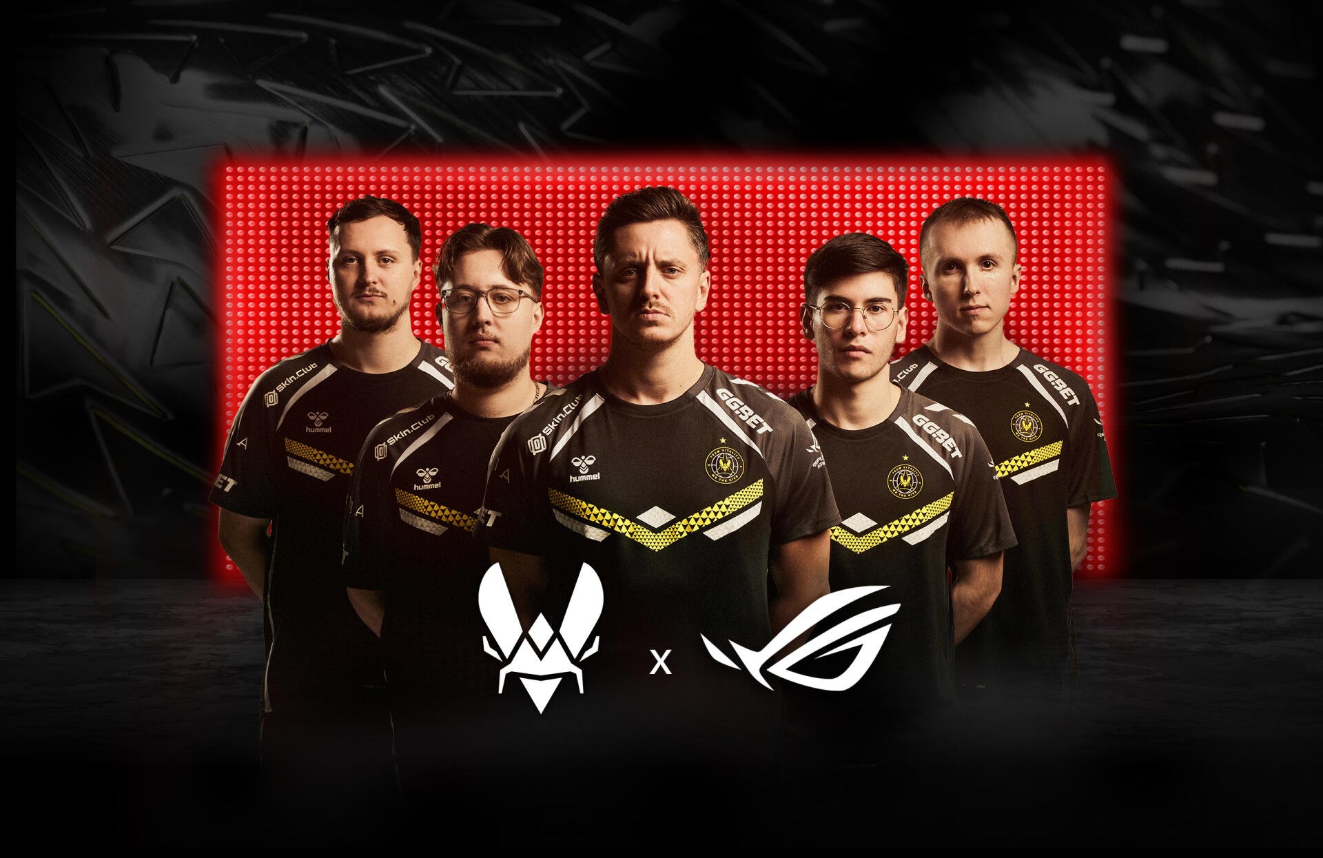Esports Team Vitality lineup in black and yellow jerseys featured with Asus ROG branding against a red LED backdrop in an HD PC desktop wallpaper.