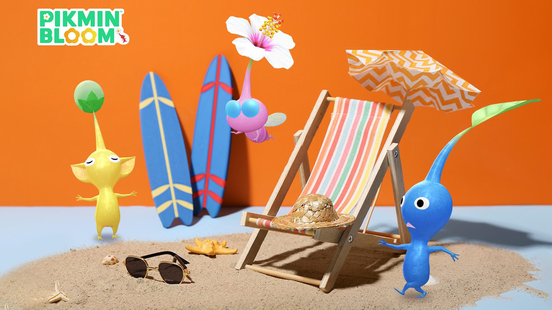 HD PC desktop wallpaper featuring Pikmin characters enjoying a sunny beach scene with surfboards, a striped beach chair, umbrella, and sand accessories.