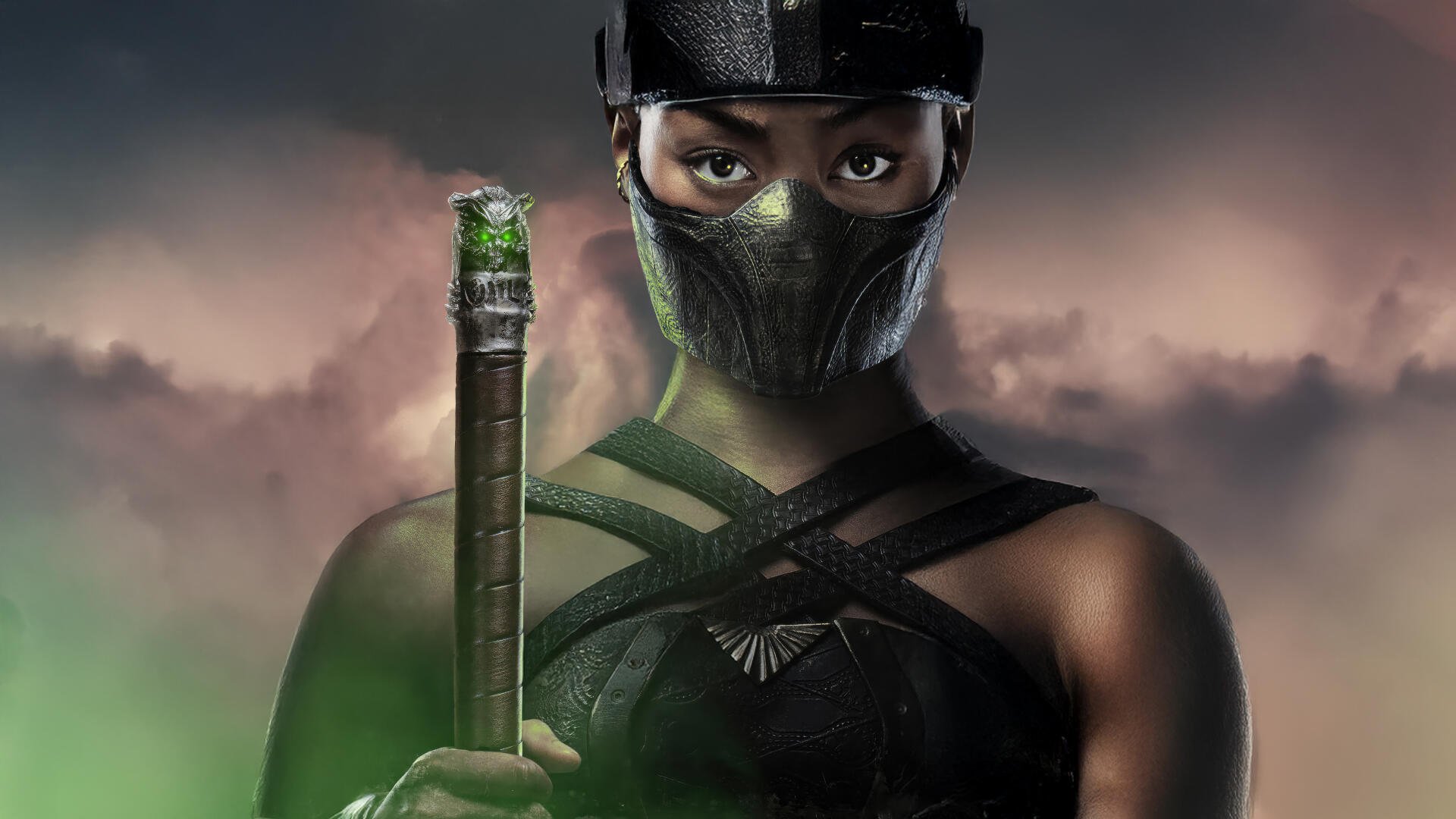 Mortal Kombat 2 (2025) 4K Ultra HD PC wallpaper featuring a masked warrior holding a glowing staff against a smoky, ominous background.