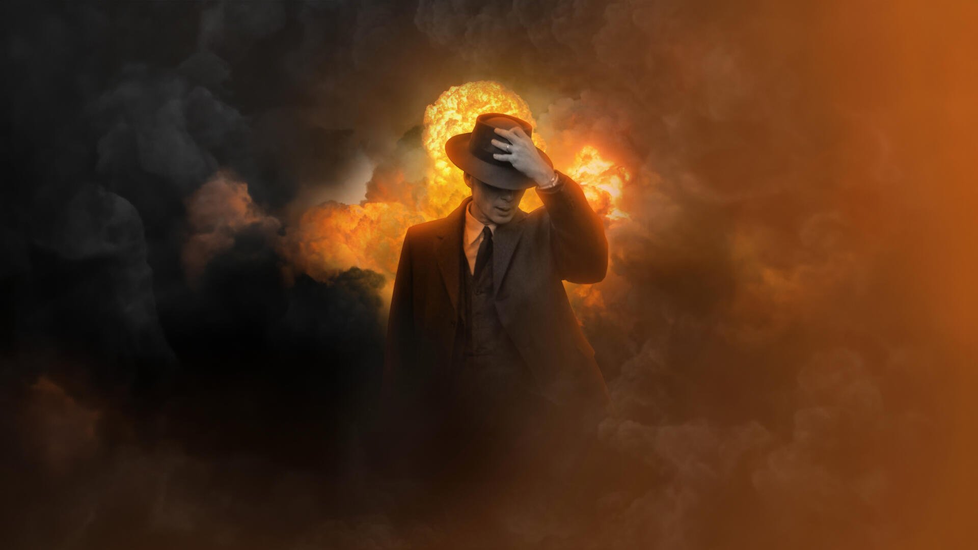 Oppenheimer-inspired 4K Ultra HD PC desktop wallpaper: silhouetted suited figure shielding their face before a fiery mushroom cloud amid smoky orange clouds.