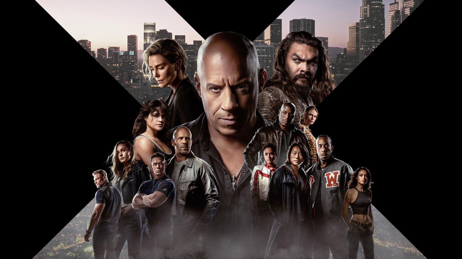 Fast X 8K Ultra HD PC desktop wallpaper: cinematic ensemble of racers and allies posed before a giant X and city skyline, smoky foreground and dramatic lighting.