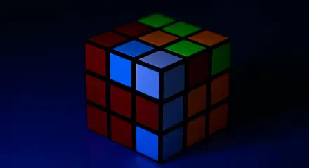 A vibrant 3D Rubik's Cube puzzle with colorful squares, rendered in sharp 4K Ultra HD, set against a dark background as a PC desktop wallpaper and background.