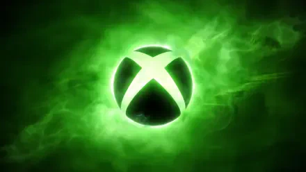 A vibrant green Xbox logo glows amidst a swirling green background, creating an engaging HD PC desktop wallpaper that embodies gaming energy and passion.