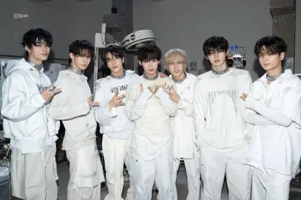 HD PC desktop wallpaper featuring the music group ENHYPEN posing together in coordinated white outfits against a neutral background.