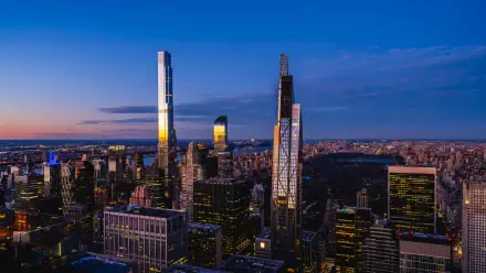 4K Ultra HD cityscape of New York City at dusk, featuring towering skyscrapers and the green expanse of Central Park in the background.