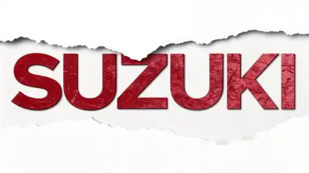 Suzuki logo with a torn paper effect in red and white, presented as a 4K Ultra HD PC desktop wallpaper and background.