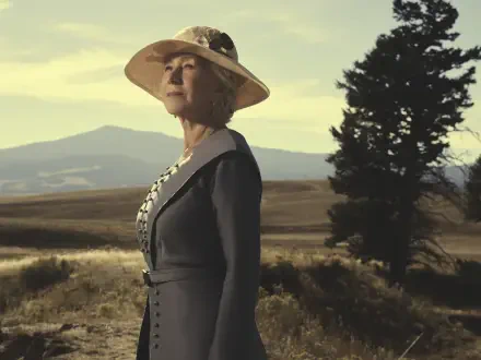 Helen Mirren in character from the TV show 1923, set against a vast rural landscape, captured in stunning 8K Ultra HD detail for a PC desktop wallpaper.