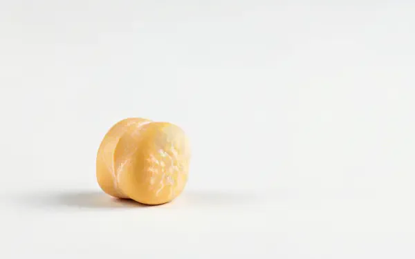 A close-up of a single chickpea on a white background, presented as a 4K Ultra HD PC desktop wallpaper and background.