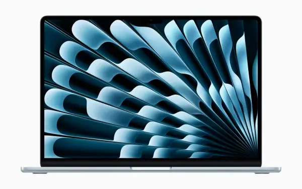 A sleek MacBook Air displays an abstract HD wallpaper, featuring fluid blue shapes that create a dynamic visual experience. Emphasizes the elegance of macOS technology.