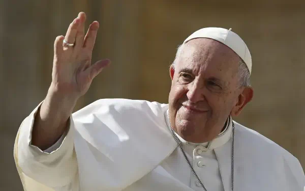 Pope Francis, also known as Jorge Mario Bergoglio, waves warmly, embodying a spirit of compassion and leadership. This HD wallpaper captures a moment of his engaged presence.