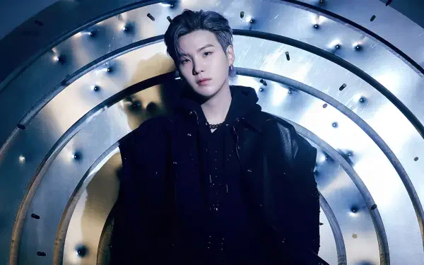 HD PC desktop wallpaper featuring Suga (Min Yoongi) of BTS, showcasing a stylish and moody K-pop music theme.