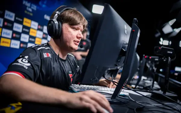 HD PC desktop wallpaper featuring s1mple, a professional esports player from FaZe Clan, focused intensely during a competitive gaming event.