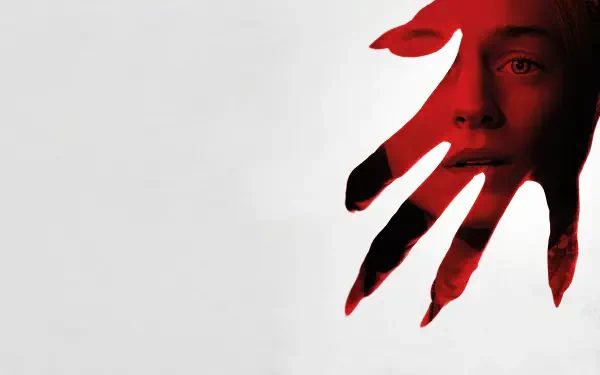 4K Ultra HD Nosferatu (2024) PC desktop wallpaper featuring a red, clawed hand overlaying a woman's face on a white background.