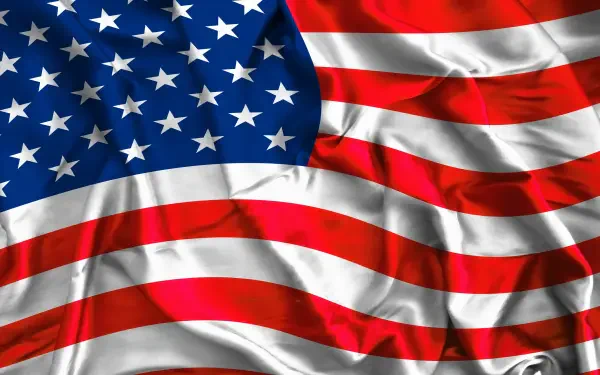 HD desktop wallpaper of the American flag waving, red and white stripes and white stars on blue, themed for the 4th of July and United States celebration.