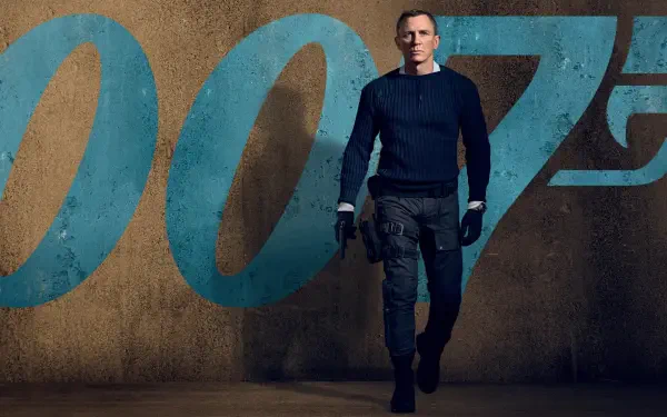 No Time to Die 4K Ultra HD PC desktop wallpaper/background: a lone man in a navy sweater and tactical pants walks before a large blue '007' emblem on a textured concrete wall.