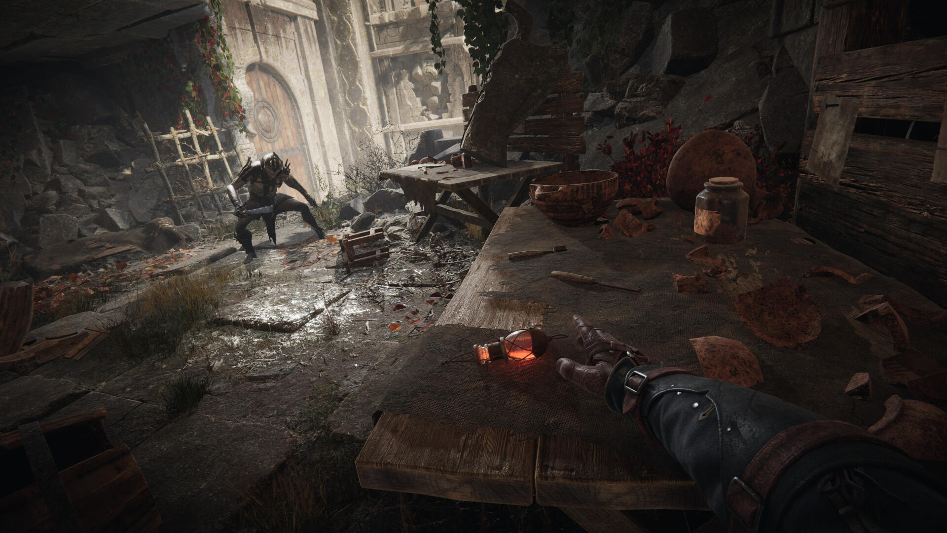 4K Ultra HD PC desktop wallpaper/background: Alkahest video game — first-person view of a gauntleted hand clutching a glowing red relic in a rain-slick, ruined medieval hall as an enemy advances.