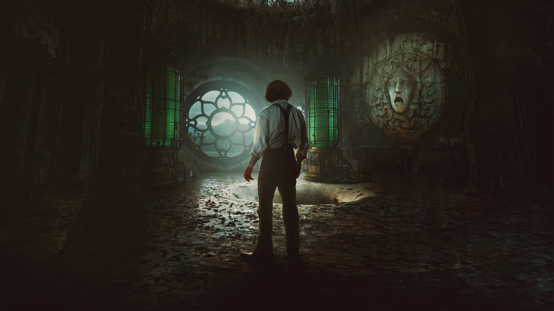 Frankenstein (2025) 4K Ultra HD PC desktop wallpaper: lone figure in a ruined, dim lab illuminated by a glowing circular window and an ominous carved stone face.