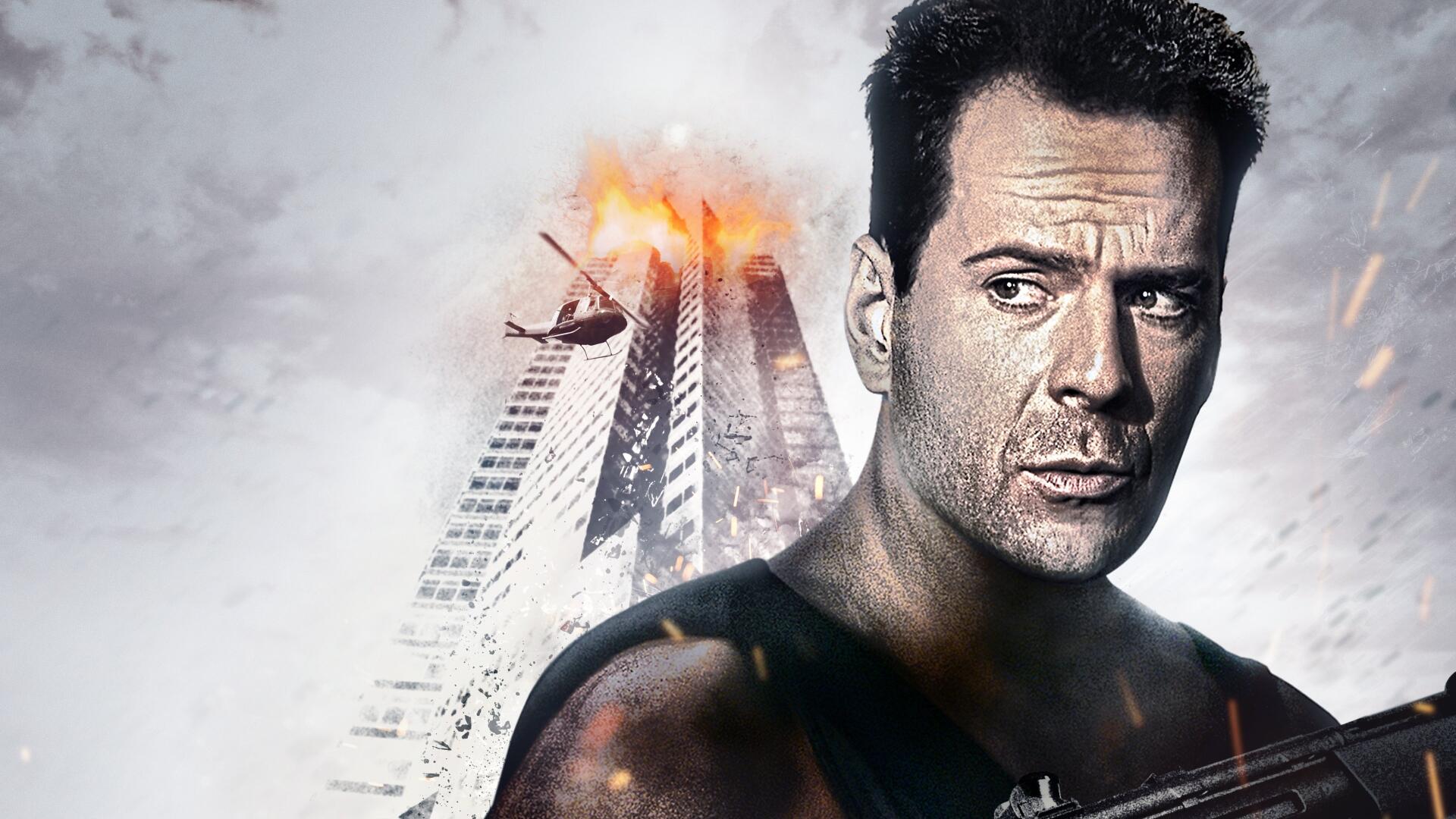Die Hard 4K Ultra HD PC desktop wallpaper: gritty close-up of a determined man in a tank top holding a gun, a skyscraper ablaze with helicopters and smoke in the background.
