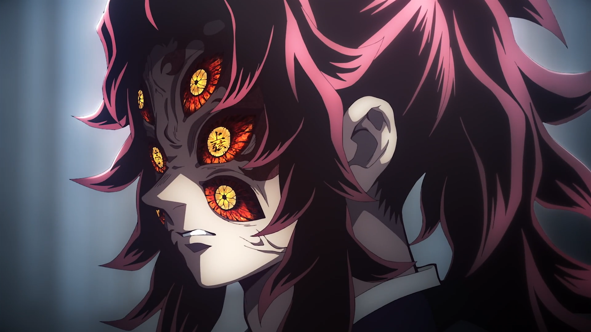 HD PC desktop wallpaper of Kokushibo (Demon Slayer: Kimetsu no Yaiba) — close-up anime profile with multiple glowing eyes, dark crimson hair and a menacing expression.