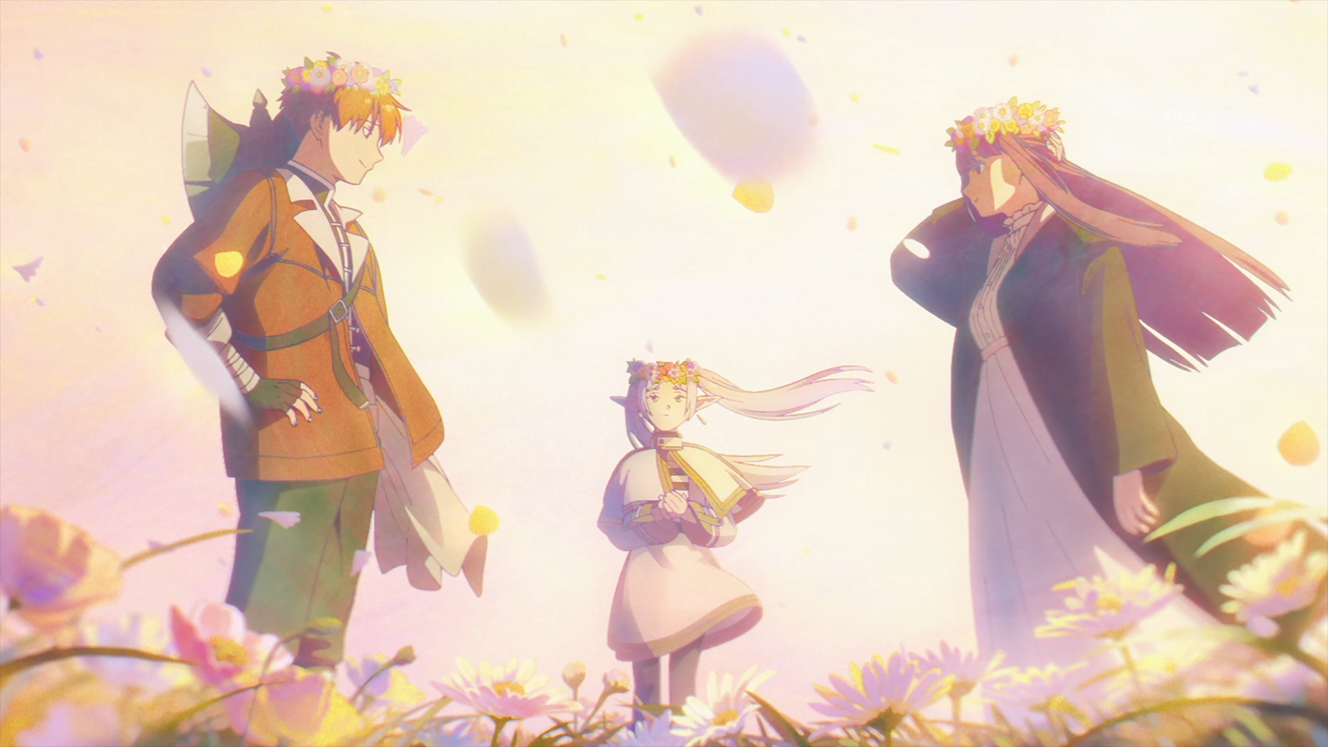 HD anime desktop wallpaper from Frieren: Beyond Journey's End, featuring Stark, Frieren and young Fern standing in a sunlit field of flowers, pastel glow and a gentle breeze.