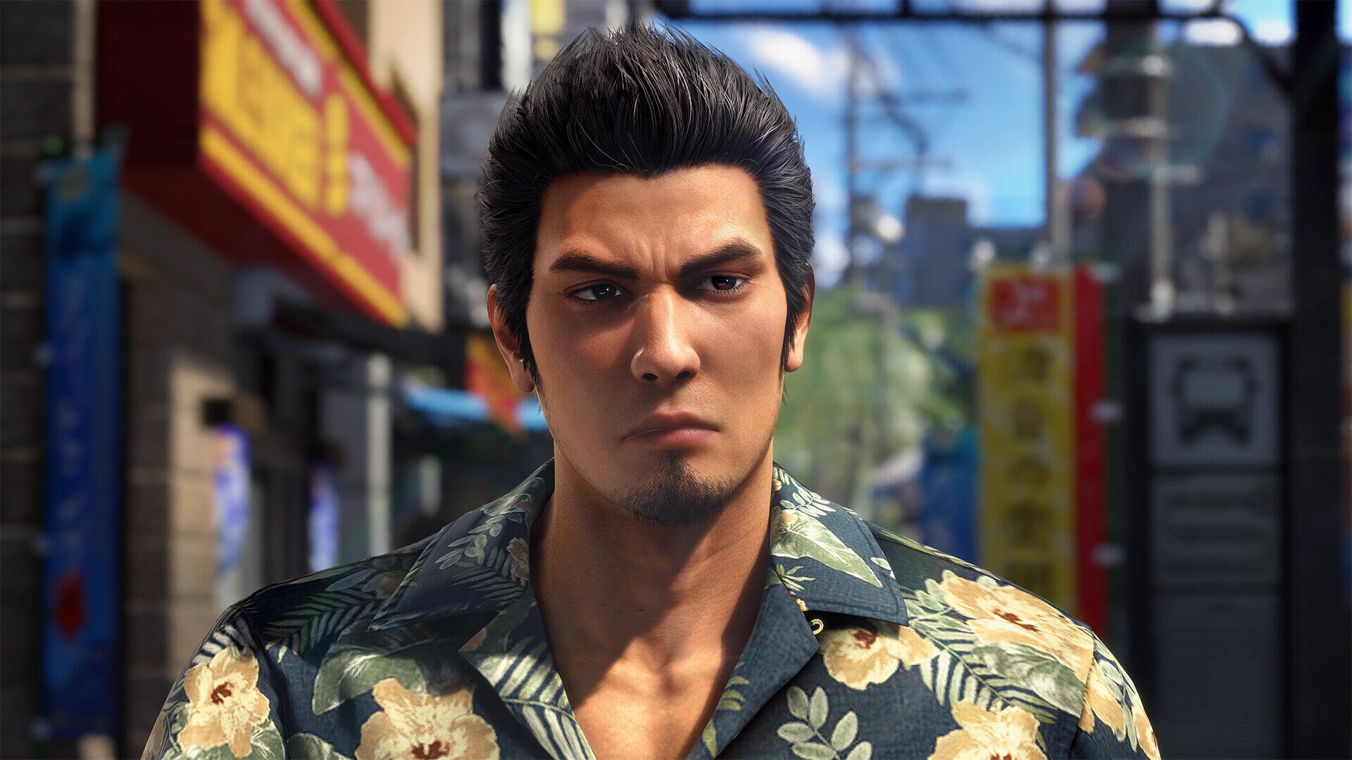 Video game HD PC desktop wallpaper of Yakuza Kiwami 3 & Dark Ties protagonist in a floral shirt, intense gaze, standing on a neon-lit Japanese street.