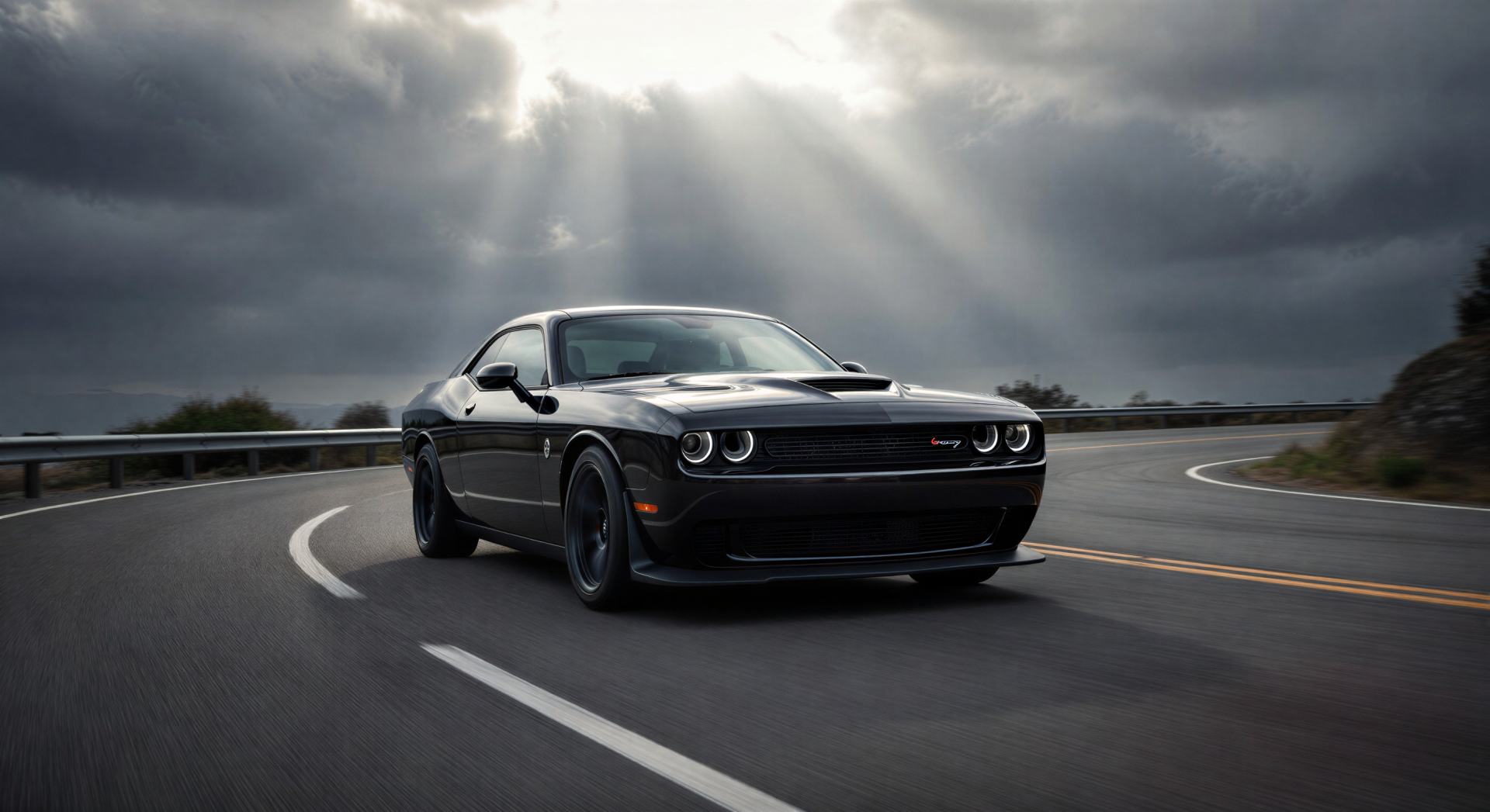Black Dodge Challenger hugging a curved road beneath dramatic sunlight rays — 2K Quad HD PC desktop wallpaper and background.