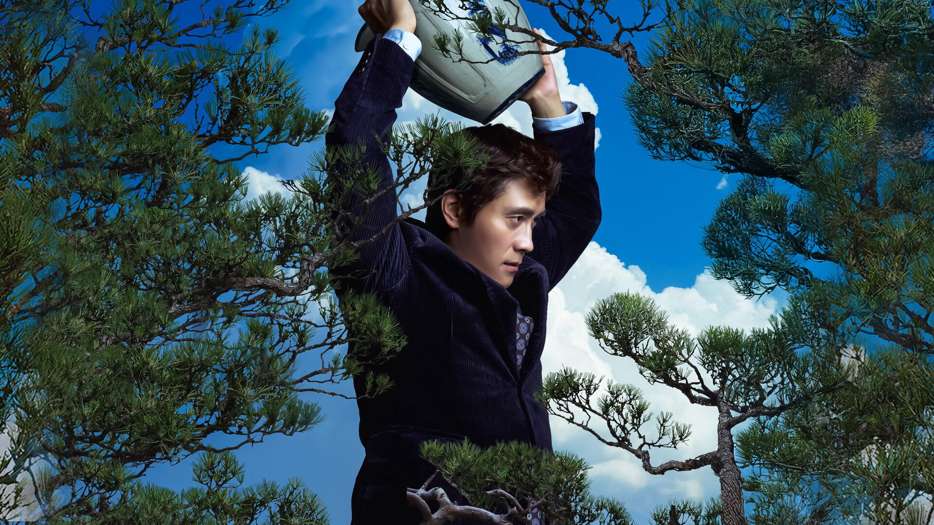 4K Ultra HD PC desktop wallpaper/background: person in a dark coat hoisting a metal basin above their head amid windswept pine branches under a vivid blue sky, titled No Other Choice.