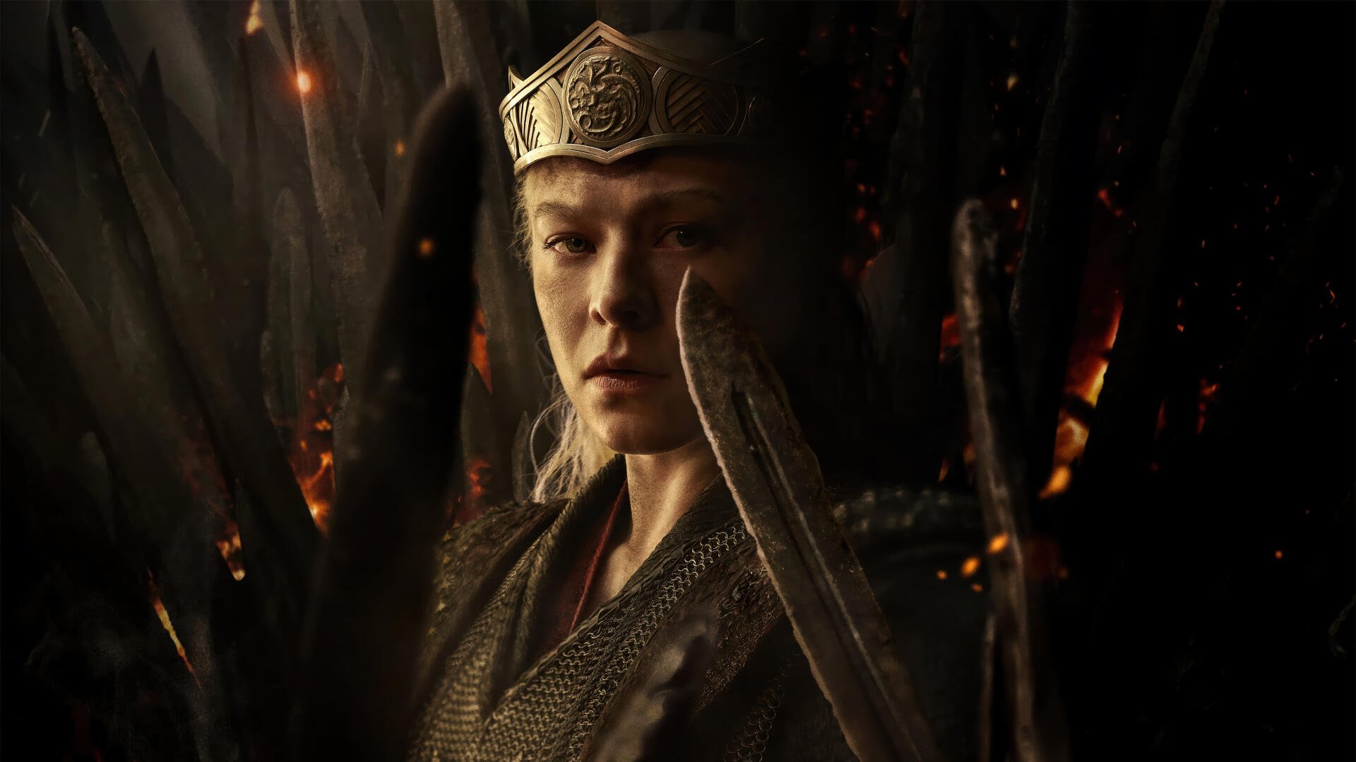 Rhaenyra Targaryen from the TV show House of the Dragon, crowned and armored, sword raised before a smoldering throne — 4K Ultra HD PC desktop wallpaper/background.
