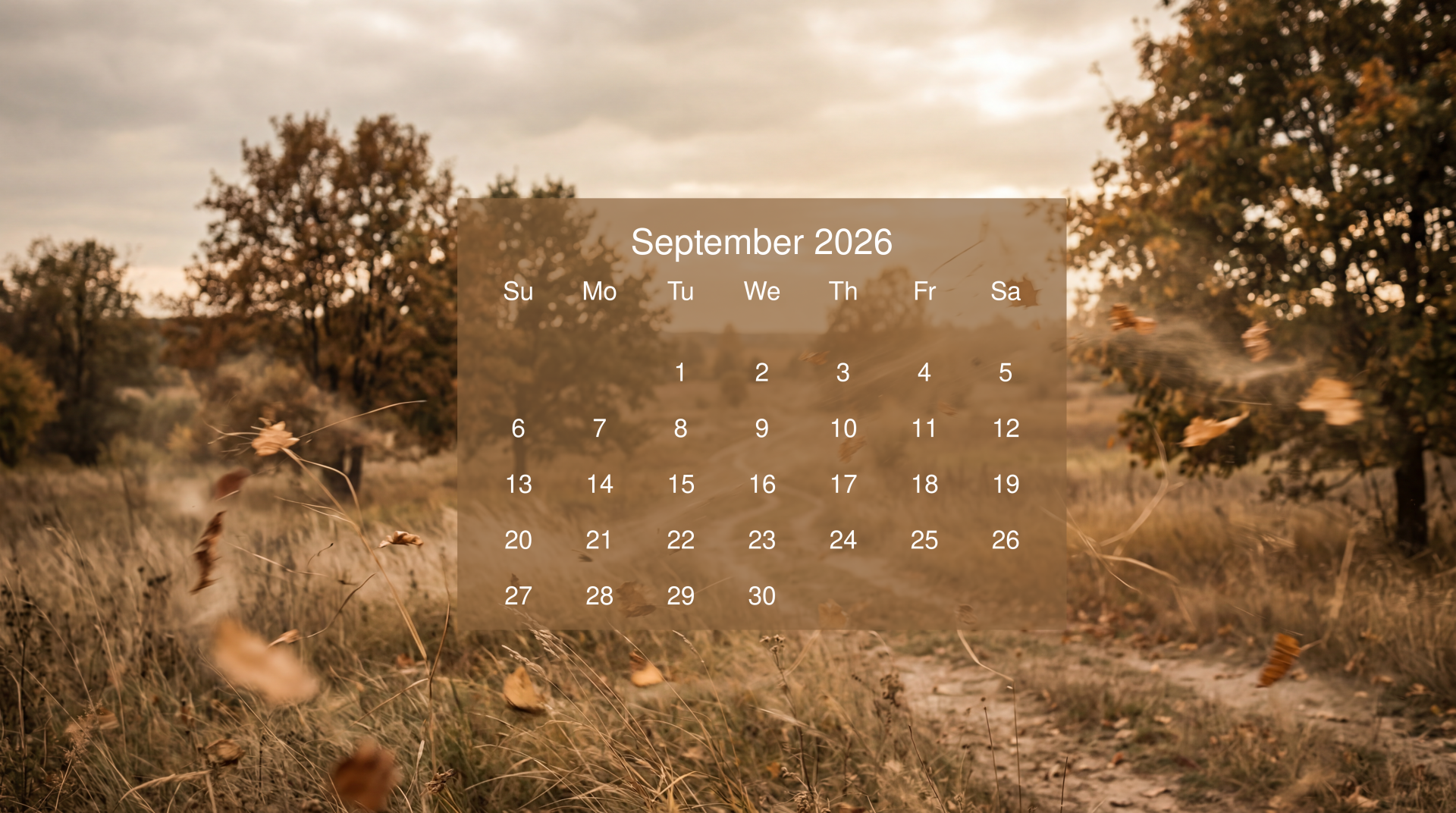 September 2026 calendar overlaid on a golden autumn field with trees and drifting leaves — 5K Ultra HD PC desktop wallpaper and background.