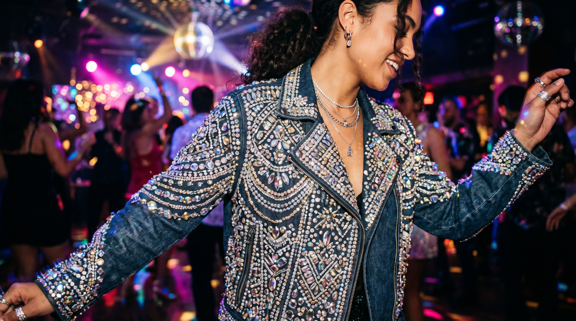 Smiling dancer in a bedazzled jacket twirls beneath disco lights amid a colorful club crowd — vibrant 5K Ultra HD PC Desktop Wallpaper and Background.