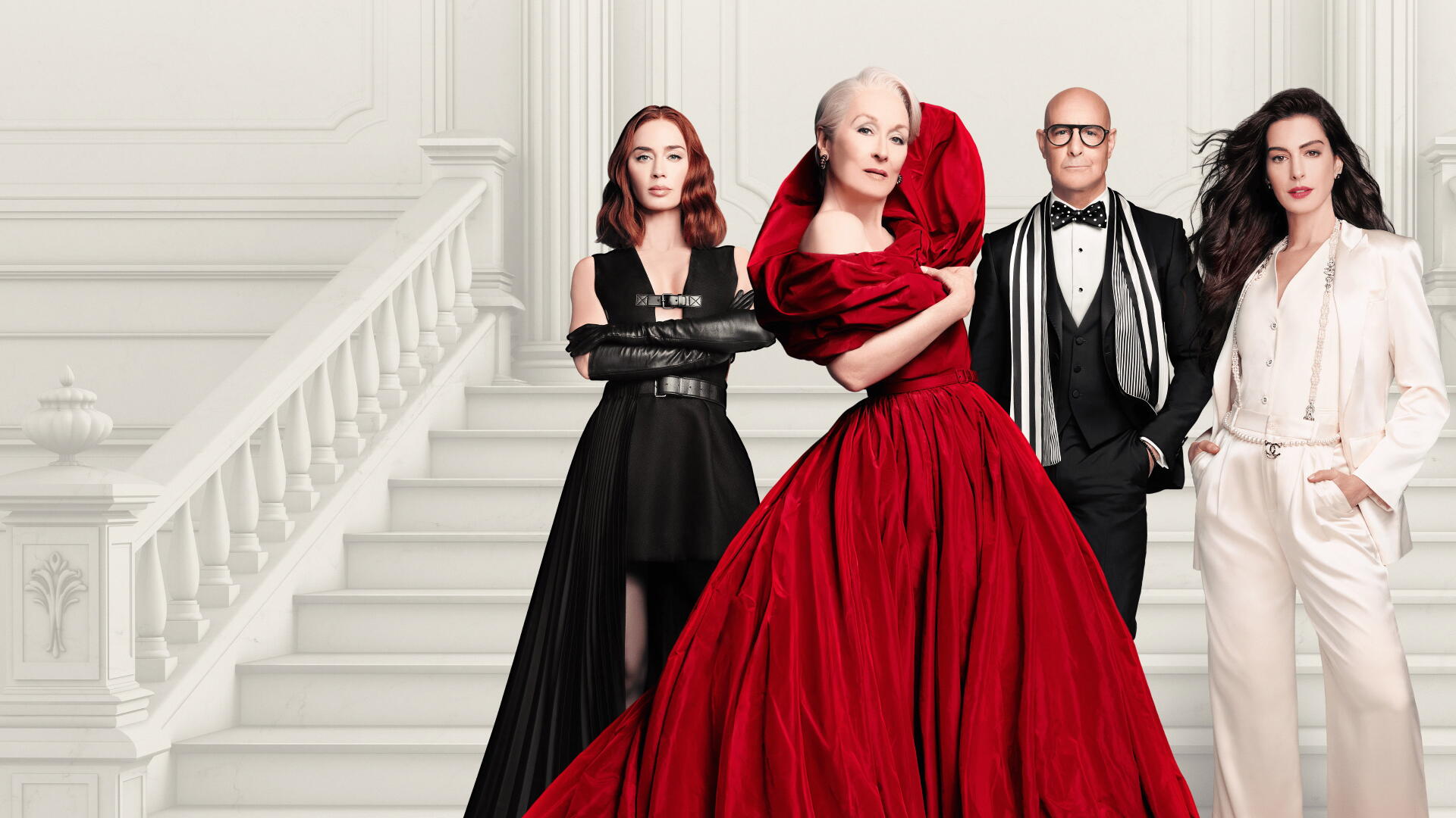 4K Ultra HD PC desktop wallpaper/background for the movie The Devil Wears Prada 2: four stylish characters on a white staircase, central figure in a sweeping red gown, others in black and white ensembles.