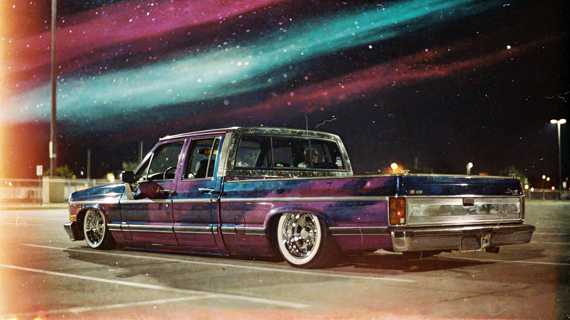 Lowrider truck with iridescent paint and chrome wheels under neon aurora skies — 4K Ultra HD PC desktop wallpaper and background.