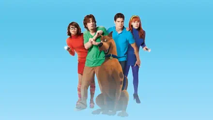 HD PC desktop wallpaper for Scooby-Doo! Curse of the Lake Monster showing Scooby-Doo with Fred, Daphne, Velma and Shaggy against a bright blue gradient background.