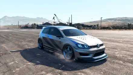 HD PC desktop wallpaper/background — Need for Speed Heat Volkswagen hatchback with widebody kit and glowing headlights drifting on an empty tarmac under a clear sky.