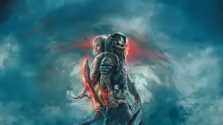 Predator: Badlands 5K Ultra HD PC desktop wallpaper and background — armored Predator and ally back-to-back in stormy blue clouds, red energy glow and wrist blades.