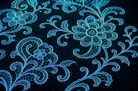 Glowing blue lace floral motifs on a dark grid, rendered as a 4K Ultra HD PC desktop wallpaper.