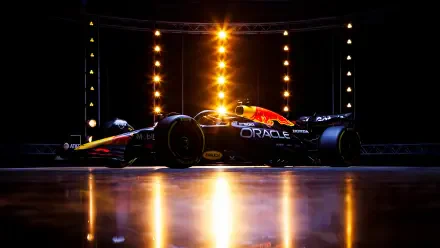 4K Ultra HD desktop wallpaper of a Red Bull RB21 F1 race car in studio lighting, sleek red-and-blue Oracle-liveried chassis reflected on a glossy floor.