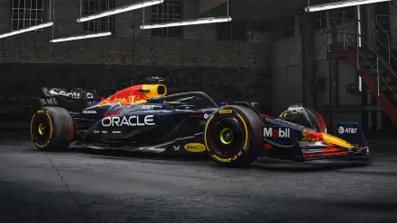 4K Ultra HD PC desktop wallpaper/background showing a Red Bull RB21 F1 race car vehicle in a dim garage, Oracle-liveried black with red and yellow accents.