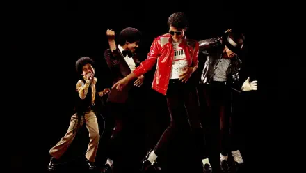 4K Ultra HD PC wallpaper labeled Michael (2026): four dynamic stage poses of a pop performer in a red jacket, single glove and fedora, silhouetted against a black background.