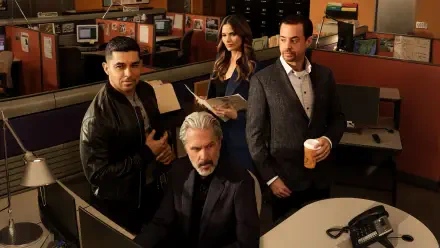 NCIS agents gathered in a dim office around a computer, serious expressions — 4K Ultra HD PC desktop wallpaper/background.